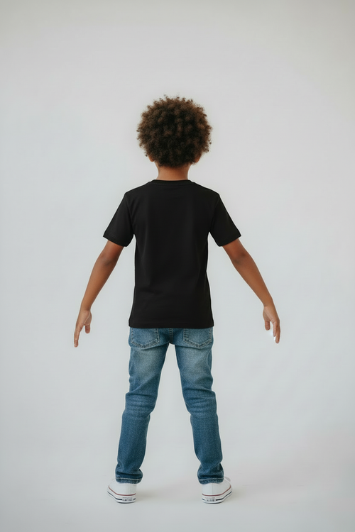 Boy in black t-shirt back view studio