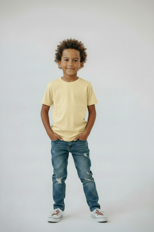 Boy in pale yellow t-shirt front view